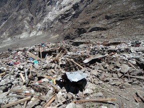 A general view of the aftermath of a massive avalanche triggered by last week's earthquake in Langtang village, Nepal, in this May 2, 2015 police handout photo. About 100 bodies were recovered on Saturday and Sunday at Langtang village, 60 km (37 miles) north of Kathmandu, which is on a trekking route popular with Westerners. REUTERS/Handout via Reuters