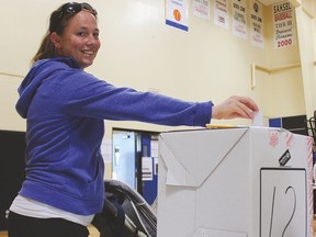Angie Seaman, of Vulcan, casts her vote at the Cultural Recreational Centre.