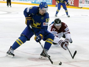 Anton Lander's linemates at the world championship in Prague, Filip Forsberg and Loui Eriksson, each have hat-tricks at the event. (David W. Cerny, Reuters)