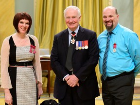 Photo by Sgt. Ronald Duchesne, Rideau Hall
Liane Wood, left, and Rev. Daniel Wood, right, of Frankford receive a Medal of Bravery from Gov. Gen. David Johnston during a ceremony at Rideau Hall in Ottawa, Friday.