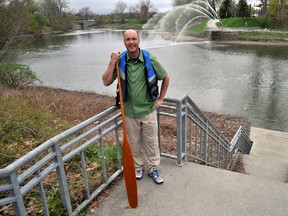 Mayor Matt Brown with a life vest and canoe paddle in London Ontario’s Ivey Park May 5, 2015. CHRIS MONTANINI\LONDONER\POSTMEDIA NETWORK