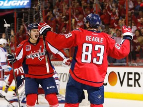 Washington Capitals centre Jay Beagle celebrates with teammate Andre Burakovsky after scoring a goal against the New York Rangers in the second period in Game 3 of the second round of the 2015 NHL playoffs at the Verizon Center. (Geoff Burke/USA TODAY Sports)