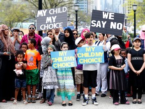 Children and parents of Coalition of Concerned Parents protest the Ontario government's new sex-ed curriculum at Queen's Park on Monday May 4, 2015. (Michael Peake/Toronto Sun)