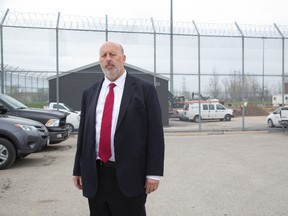 Assistant Deputy Minister Steven Small says Regional Intermittent Centres like the one going up behind him in London Tuesday are a secure, efficient way to ease crowding and keep weekend inmates separate from the general jail population. (DEREK RUTTAN, The London Free Press)