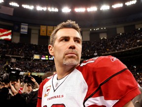 Quarterback Kurt Warner of the Arizona Cardinals looks on as he stands on the field after their 45-14 loss against the New Orleans Saints during the NFC Divisional Playoff Game at Louisana Superdome on January 16, 2010. (Ronald Martinez/Getty Images/AFP)