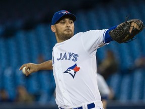 Toronto Blue Jays starter Marco Estrada delivers a pitch against the New York Yankees in Toronto Tuesday May 5, 2015. (Craig Robertson/Toronto Sun/Postmedia Network)