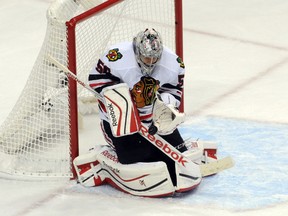 Chicago Blackhawks goalie Corey Crawford makes a save against the Minnesota Wild during Game 3 of their second-round playoff series Tuesday at Xcel Energy Center. (Marilyn Indahl/USA TODAY Sports)