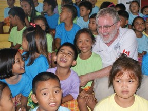 Seaforth resident Chris Hills takes in a celebration with local Filipino children during his visit to the southeast Asian nation last month as part of charity work for Sleeping Children Across the World (Chris Querido/Submitted)
