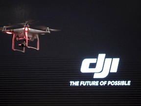The DJI Phantom 3, a consumer drone, takes flight after it was unveiled at a launch event in Manhattan, April 8, 2015. REUTERS/Adrees Latif