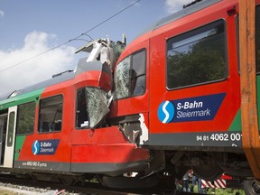 This picture taken on May 6, 2015 shows two local trains that collided head-on near Uebelbach, Austria. (AFP PHOTO/APA/ERWIN SCHERIAU)