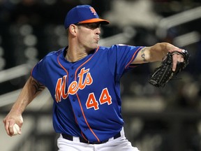 Seen here in this April 23, 2014 photo with the New York Mets, relief pitcher Kyle Farnsworth has opted for football as his post-baseball career. (Adam Hunger-USA TODAY Sports)