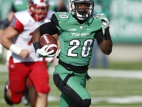 Steward Butler of the Marshall Thundering Herd rushes for a 48-yard touchdown on November 28, 2014 in Huntington, West Virginia. (Joe Robbins/Getty Images/AFP)