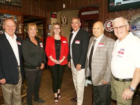 The 2015 Sudbury Sports Hall of Fame inductees include Larry Bedard, left, and Cathy Inch in the Builders' Category, Jessica Young and Dave Ross, representing Canada Brokerlink in the Corporate Category, Gary Ricker, Builders' Category, and Alex Fex in the Players' Category. Inductees missing from picture include Meagan Duhamel, the late Sophie Manarin, Dan McCourt, Paul Brunelle and the Voima Athletic Club.
