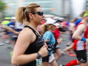 Runners begin the Scotiabank Ottawa Marathon along Elgin Street on Sunday, May 25, 2014. Errol McGihon/Ottawa Sun/QMI Agency