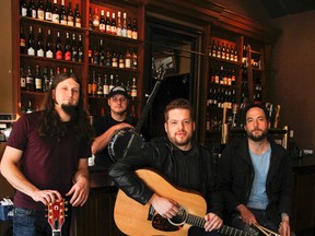Matt Kirby, left, Nick 'Pickins' Patterson, Ryan Gollogly and Aidan Campbell are members of local band Goldwing, which will perform early Sunday morning at Sir John’s Public House as part of the Homegrown Live! Music Festival. (Julia McKay/The Whig-Standard)