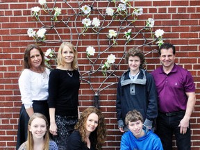 A short ceremony was held last Thursday, April 30 at Mitchell District High School (MDHS) involving a Peace Tree, which along with peace blossoms was created by staff members John Schmalz (back row, right) and Trish Menheere (back, left). The iron peace tree is anchored to the wall close to the front entrance of the school, and will be clearly visible for all who enter, illustrating the school’s appreciation for each other’s differences. Pictured after the ceremony were vice-principal Kim Crawford (back row, second from left) and Shay Linton; and in front, Mikayla McMann, principal Emma Bannerman and Derrick Knill. Various community businesses and organizations were invited to place a peace blossom on the tree during the ceremony. ANDY BADER/MITCHELL ADVOCATE