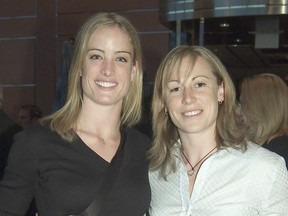 Partners Kathleen Kauth, left, a former member of the United States women’s hockey team, and Kingston’s Jayna Hefford are the parents of a two-year-old daughter and a four-week-old son. (Postmedia Network file photo)