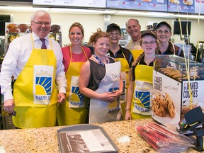 Community leaders pose with restaurant staff behind the counter at the McDonald's on North Front Street. As part of McHappy Day, an event to raise funds for the Quinte Children’s Foundation as well as Ronald McDonald House charities, community leaders served the public. TIM MILLER/ THE INTELLIGENCER