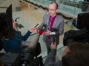 Ward 1 City Councillor Andrew Knack speaks to the media  as City Council continues the 2015 City Budget deliberations City Hall, in Edmonton Alta., on Thursday Nov. 27, 2014. David Bloom/Edmonton Sun/Postmedia Network