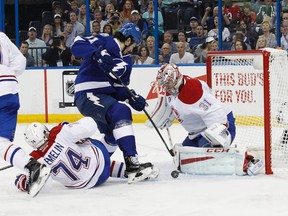 Montreal Canadiens goalie Carey Price (31) makes a save on Tampa Bay Lightning centre Brian Boyle during Game 3 of their second-round playoff series Wednesday at Amalie Arena. (Kim Klement/USA TODAY Sports)