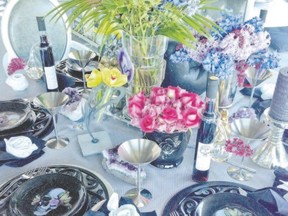 Brightly coloured flowers and skull plates give this layered table setting an edgy, feminine yet rock-and-roll vibe. (Supplied photo)