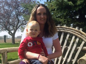 Lindsay Lackey and her 17-month-old son Benjamin enjoy the spring weather at their Shedden-area home. Benjamin has reflex anoxic seizures - a condition that causes him to lose consciousness with little warning. Lackey has started a support group for mothers of children with RAS.