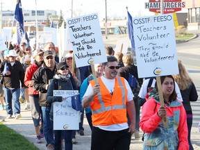 Local high school teachers protest outside a local hotel where Premier Kathleen Wynne spoke to delegates at the Federation of Northern Ontario Municipalities (FONOM) conference in Sudbury Thursday morning.John Lappa/The Sudbury Star