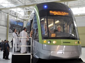 Employees and guests tour a Bombardier LRV train at the manufacturing facilities in Toronto in this May 29, 2012 file picture. (REUTERS/Mike Cassese/Files)
