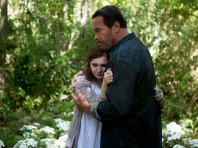 Arnold Schwarzenegger with Abigail Breslin in a scene from Maggie. (Handout photo)