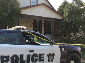 Sarnia police and the regional coroner's office are investigating a death after a body was found at this address at the corner of Russell and Cobden streets Wednesday. Police have not said if foul play is suspected. (Tyler Kula/Sarnia Observer/Postmedia Network)