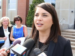 Briana Fram, sister of Jordan Fram who died in a mining fatality on June 8, 2011, speaks to reporters at the Sudbury Courthouse on Thursday. John Lappa/The Sudbury Star
