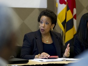 Attorney General Loretta Lynch speaks with members of Congress and faith leaders at the University of Baltimore, in Baltimore, Maryland May 5, 2015.    REUTERS/Jose Luis Magana/Pool