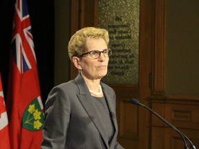 Ontario Premier Kathleen Wynne tells reporters on Tuesday. May 5 2015 that she still seeks a negotiated settlement with teacher associations. Antonella Artuso/Postmedia Network