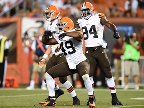 Jamaal Westerman (#49) celebrates after a sack during a 2014 preseason game as a Cleveland Brown. Westerman signed with the Blue Bombers on Thursday. (Joe Sargent/Getty Images/AFP file photo)