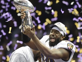Ed Reed of the Baltimore Ravens holds aloft the Vince Lombardi Trophy following their win in Super Bowl XLVII at the Mercedes-Benz Superdome on February 3, 2013 in New Orleans. (AFP PHOTO/TIMOTHY A. CLARY)