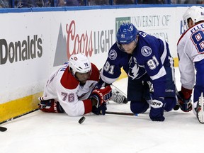 Montreal Canadiens defenceman P.K. Subban and Tampa Bay Lightning centre Steven Stamkos fight to control the puck during Game 4 Thursday at Amalie Arena. (Kim Klement/USA TODAY Sports)