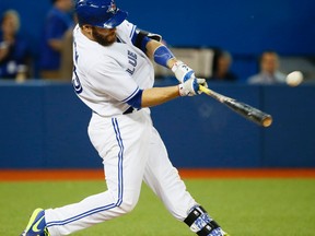 Russell Martin connects for his home run on May 6, 2015. Martin has hit a home run in each of the past four Blue Jays games in which he has been in the starting lineup. (STAN BEHAL/Toronto Sun)