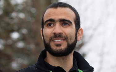 Omar Khadr speaks to the media outside his lawyer's west Edmonton home, where he will be staying after being granted parol, in Edmonton, Alta. on Thursday May 7, 2015. David Bloom/Edmonton Sun/Postmedia Network