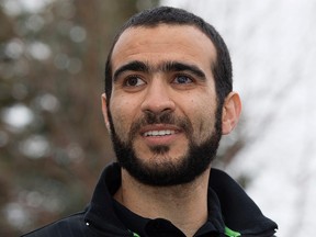 Omar Khadr speaks to the media outside his lawyer's west Edmonton home, where he will be staying after being granted parole, in Edmonton, Alta. on Thursday May 7, 2015. (David Bloom)