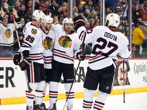 Chicago Blackhawks Bryan Bickell, Brent Seabrook, Brad Richards and defenceman Johnny Oduya celebrate during Game 4 Thursday at Xcel Energy Center in Chicago. (Marilyn Indahl/USA TODAY Sports)