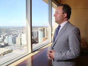 Jonathan Denis is pictured in his lawyer's office in downtown Calgary, Alta on Thursday May 7, 2015. Jim Wells/Calgary Sun/Postmedia Network