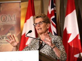 Premier Kathleen Wynne addresses delegates at the Federation of Northern Ontario Municipalities conference in Sudbury, Ont. on Thursday May 7, 2015. John Lappa/Sudbury Star/Postmedia Network