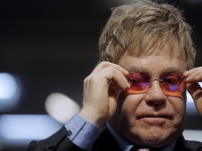 Singer Elton John, founder of the Elton John AIDS Foundation pauses as he testifies before a Senate Appropriations State, Foreign Operations and Related Programs Subcommittee hearing on global health problems in Washington May 6, 2015. REUTERS/Carlos Barria