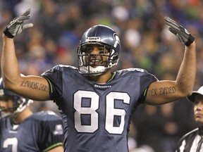 Seattle Seahawks Jerramy Stevens celebrates after scoring a touchdown against the Dallas Cowboys during their NFC Wild Card playoff game in Seattle January 6, 2007. (Postmedia Network file photo)