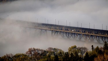 Spectacularly impressive fog covers most of the High Level Bridge as it rolled through Edmonton's river valley as the sun rose on Friday on May 8, 2015. Lincoln Ho/Edmonton Sun Reader Photo