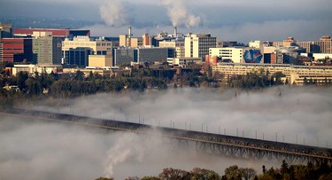 Spectacularly impressive fog covers most of the High Level Bridge as it rolled through Edmonton's river valley as the sun rose on Friday on May 8, 2015. Lincoln Ho/Edmonton Sun Reader Photo
