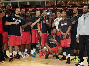 Maybe not the team photo they were hoping for, but Windsor Express gather for one last team shot after the NBL Canada Championship game was ?postponed? at WFCU Centre April 30, 2015. (NICK BRANCACCIO, The Windsor Star)