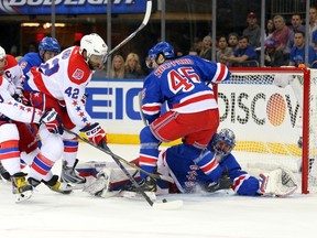 Washington Capitals right wing Joel Ward (42) and Washington Capitals left wing Alex Ovechkin (8) look to shoot against New York Rangers goalie Henrik Lundqvist (30) in front of New York Rangers left wing James Sheppard (45) during the first period of Game 5 on May 8. (USA Today Sports)