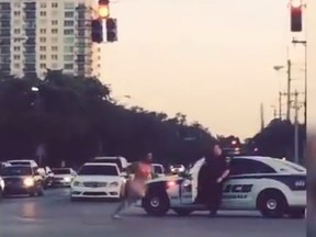 A man, who later told police he was high on the synthetic drug flakka, is seen streaking through Florida streets earlier this year.
(Screenshot from YouTube)