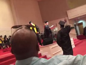 A high school graduation ceremony in Georgia was tainted Friday thanks to distasteful remarks made by its principal.
(Screenshot from Twitter video)